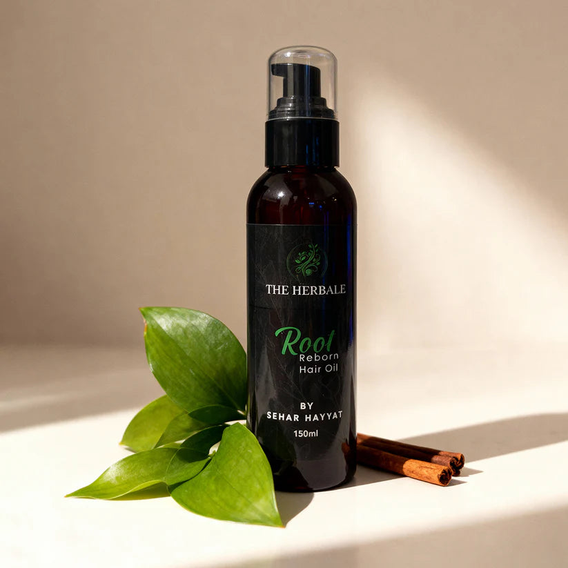 Root Reborn Hair Oil by Sehar Hayvat - 150ml bottle with fresh cinnamon sticks and green leaves, showcasing a natural, healthy hair care solution for stronger and shinier hair.
